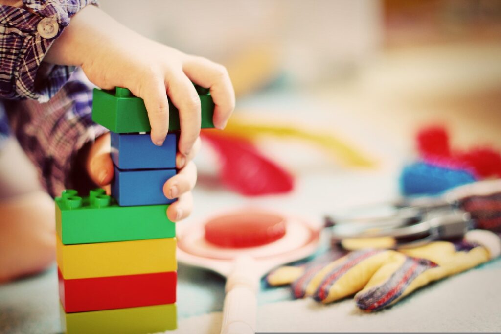 2-year-old building block tower