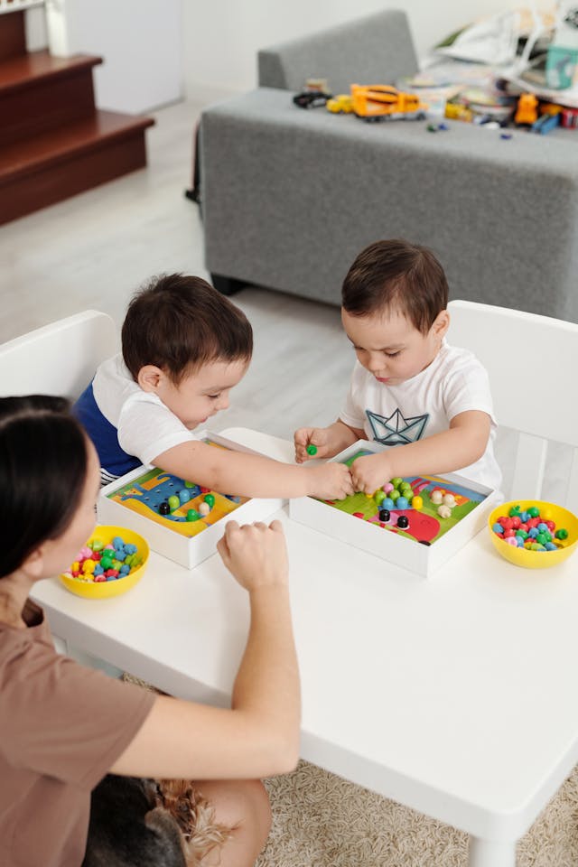 toddler playing with sensory games